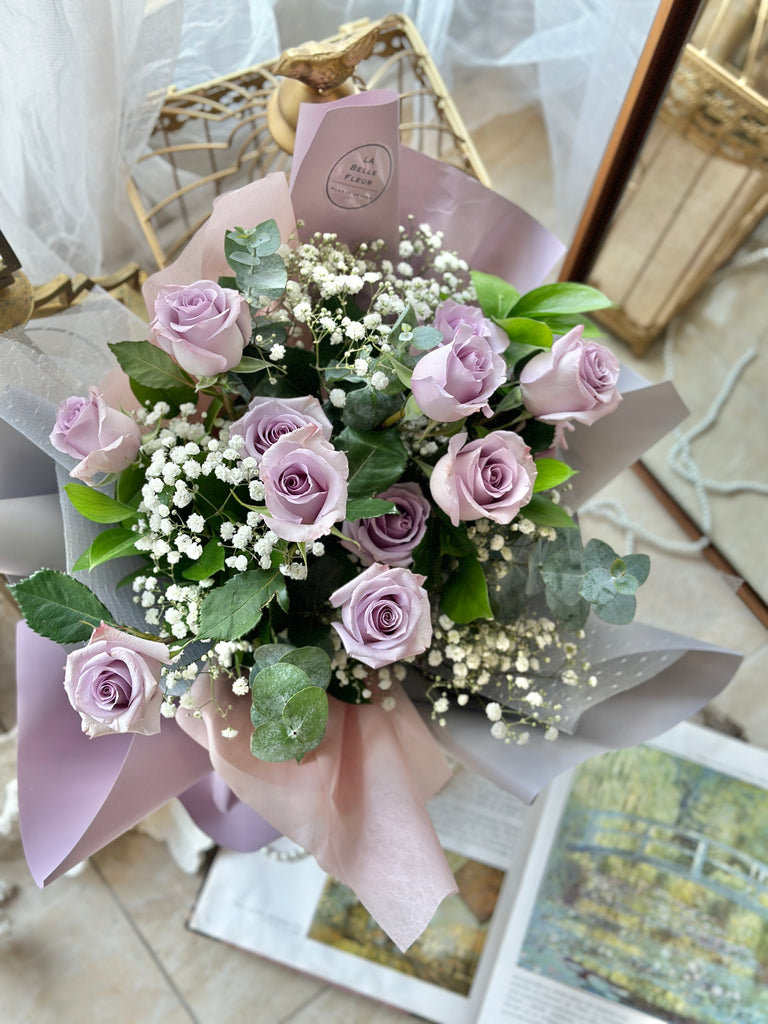 12 lavender roses bouquet with baby's breath