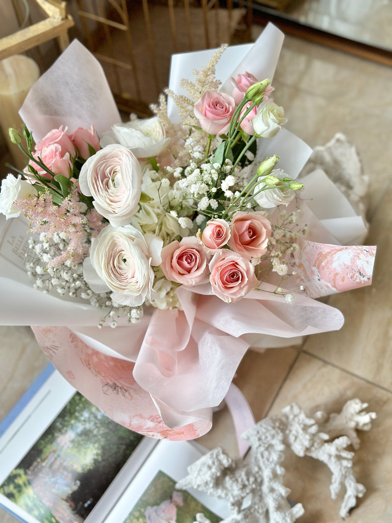 white and pink blush ranunculus bouquet