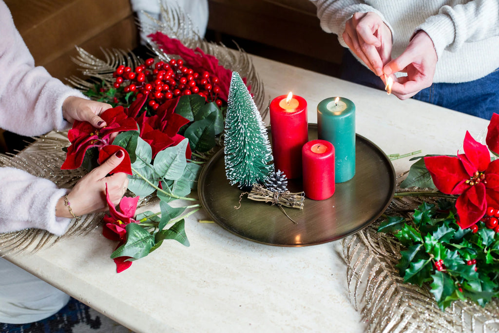 Christmas flower arrangements on table