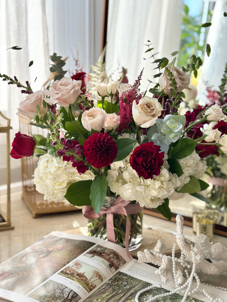 white burgundy blush flower arrangement