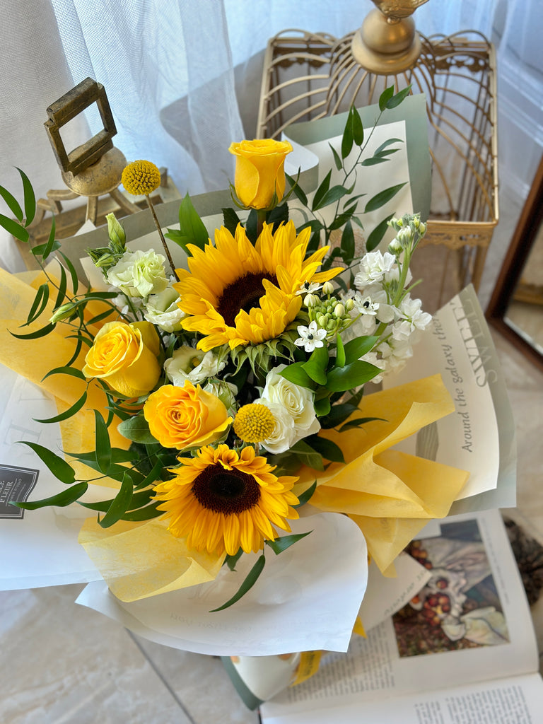 Sunflower bouquet with yellow roses