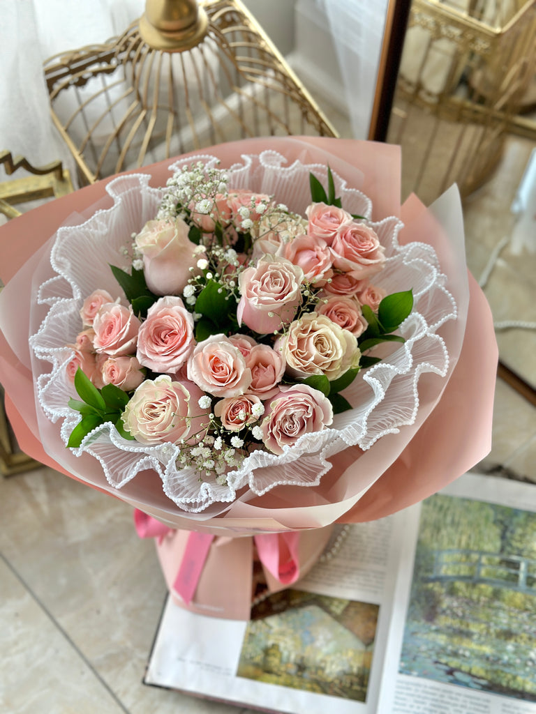 pink spray roses and pink rose bouquet with luxury wrapping 
