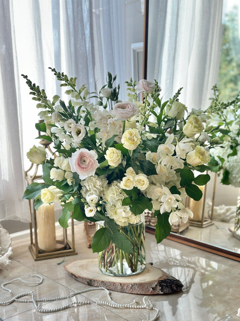 luxury white and champagne flower arrangement