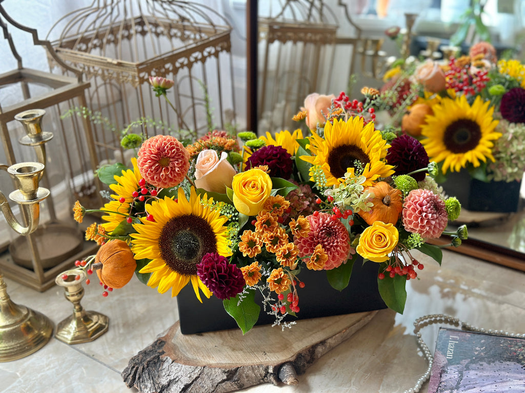 Close shot of the Autumn Beauty Sunflower Thanksgiving Centrepiece by La Belle Fleur