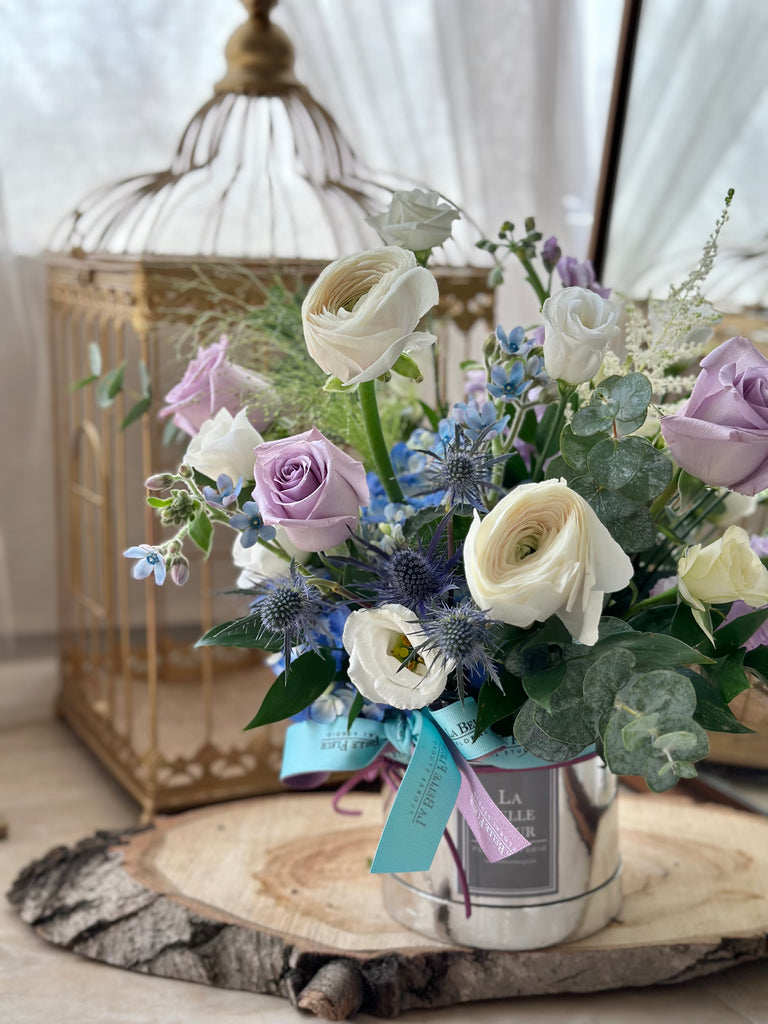 white and lavender blue Flower box arrangement toronto