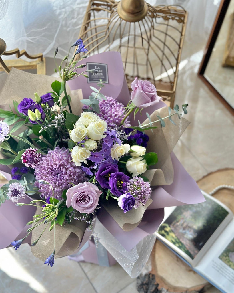Purple mix Bouquet with lavender wrapping 