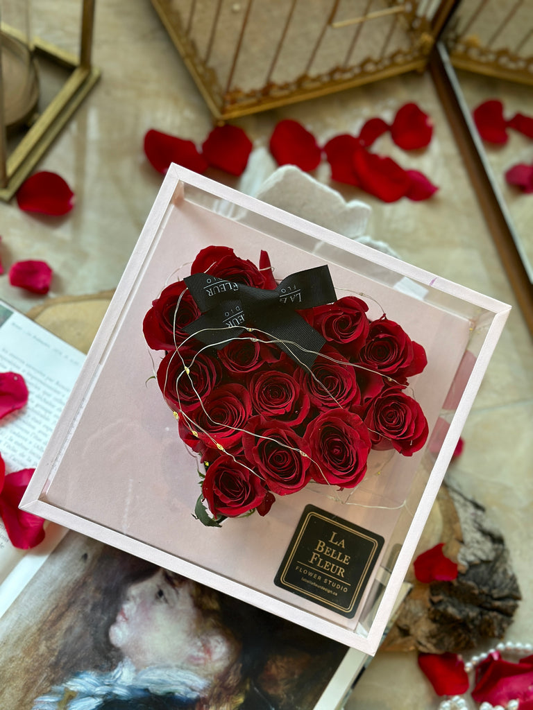 heart shaped red rose box arrangement with lighting