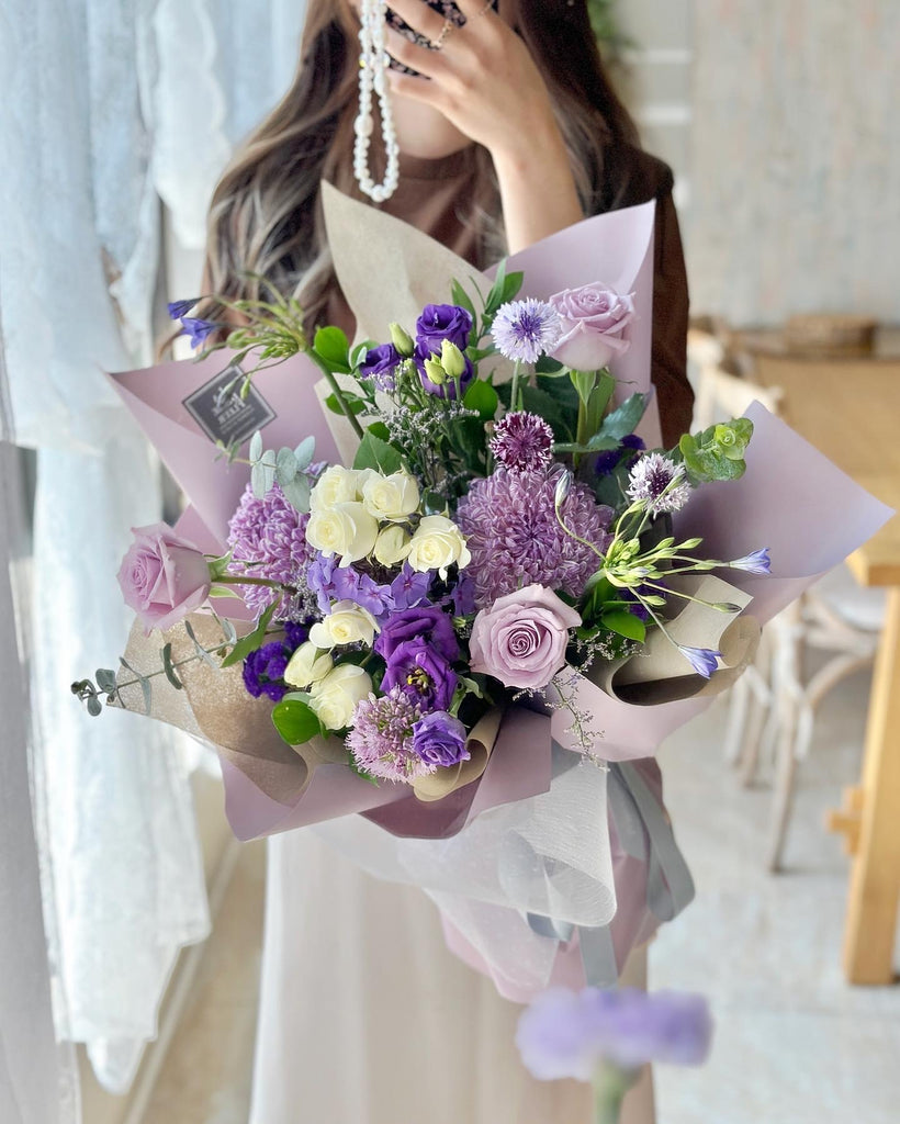 white and purple mix flower bouquet
