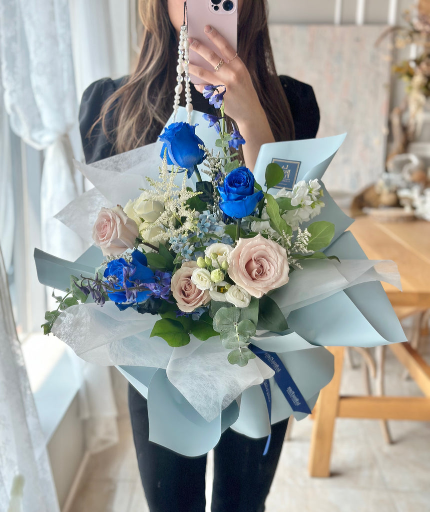 Blue Mix Flower Bouquet with blue wrapping