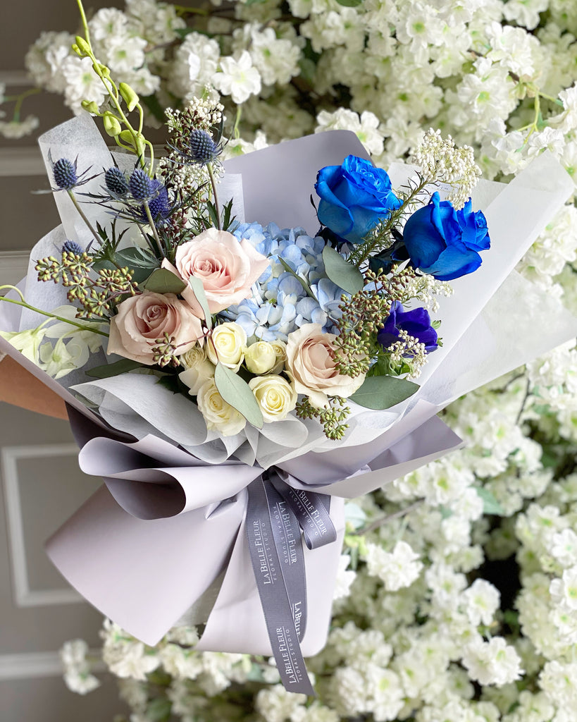blue bouquet in blue wrap