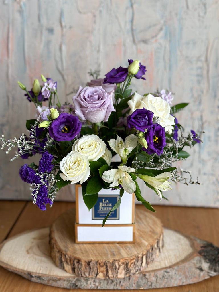 White Purple flowers in a box