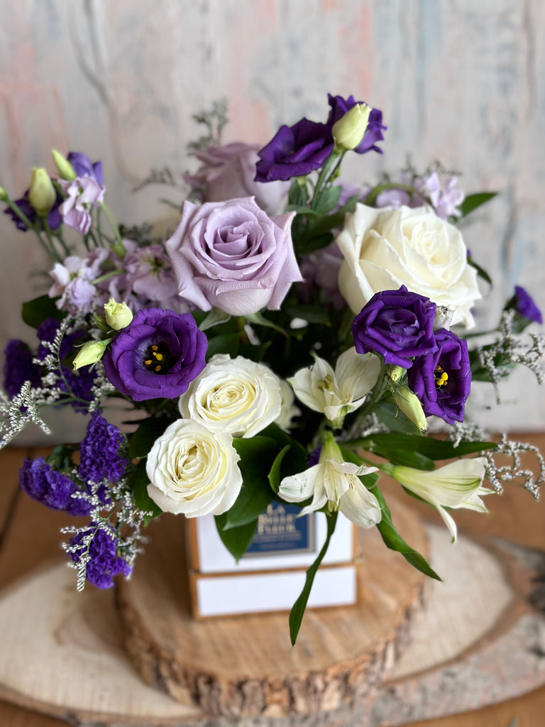 White Purple flowers in a box