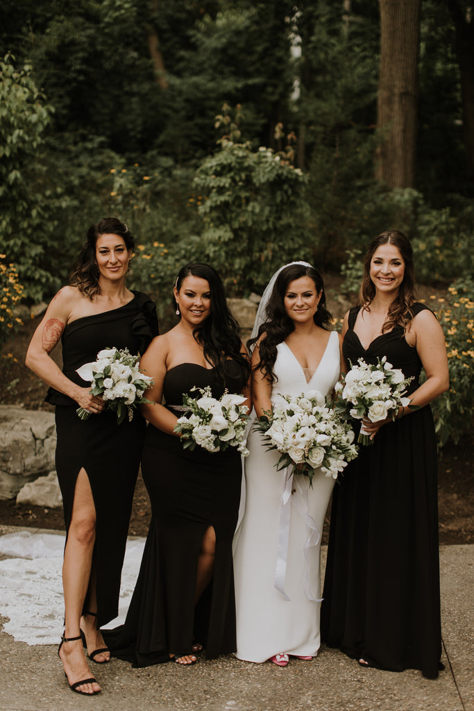 four woman holds Bridal Bouquet
