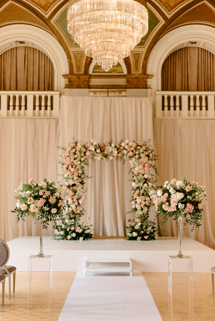 archer flowers in wedding hall